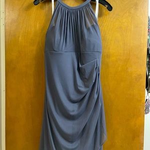 Never worn, the wedding was cancelled.Size 12 Pewter grey. Purple is for display